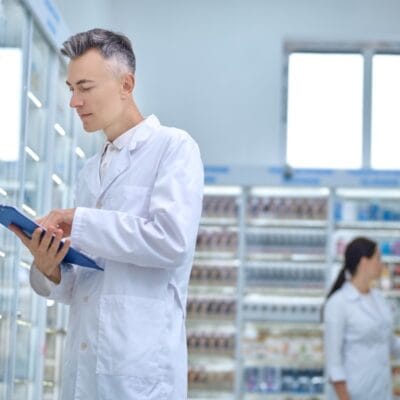 two-pharmacists-making-medicines-revision-drugstore-1