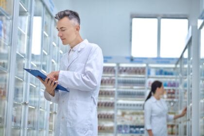 two-pharmacists-making-medicines-revision-drugstore-1