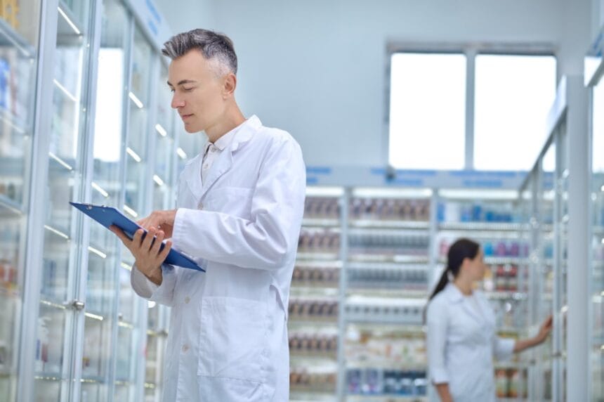 two-pharmacists-making-medicines-revision-drugstore-1