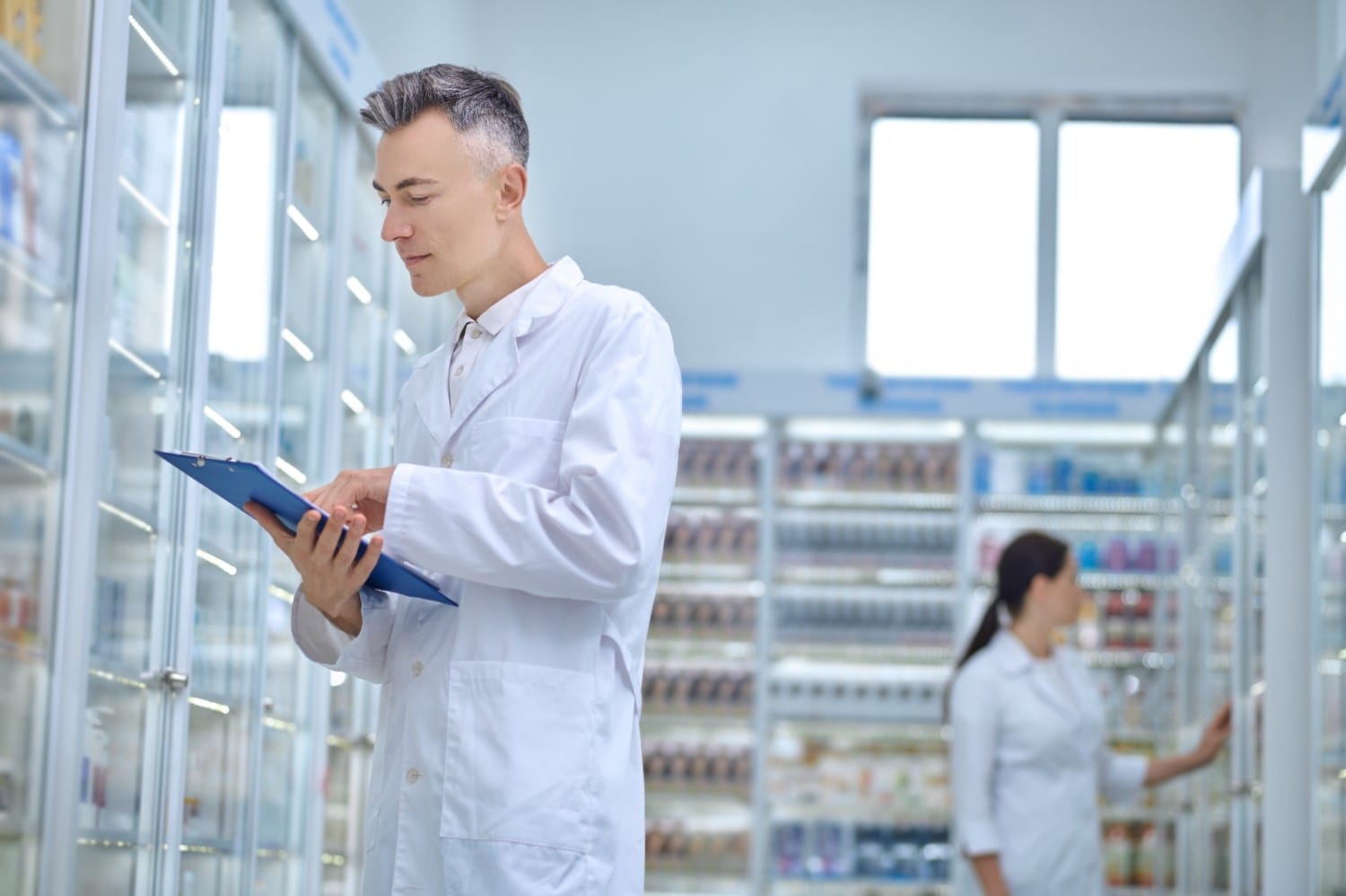 two-pharmacists-making-medicines-revision-drugstore-1
