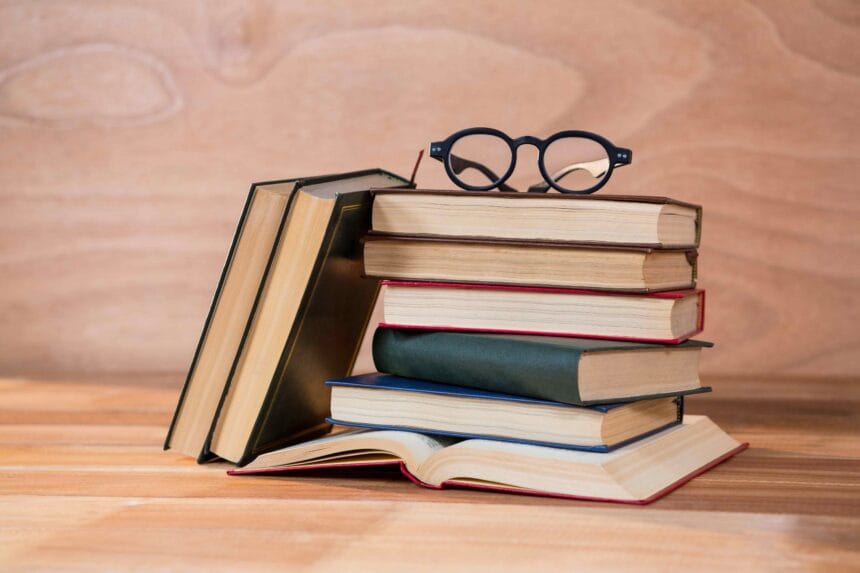 various-books-with-spectacles-table-1-1
