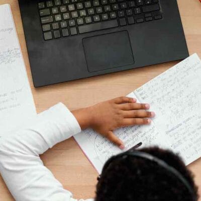 1000-x66-boy-doing-homework-with-use-lapt
