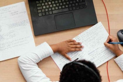 1000-x66-boy-doing-homework-with-use-lapt