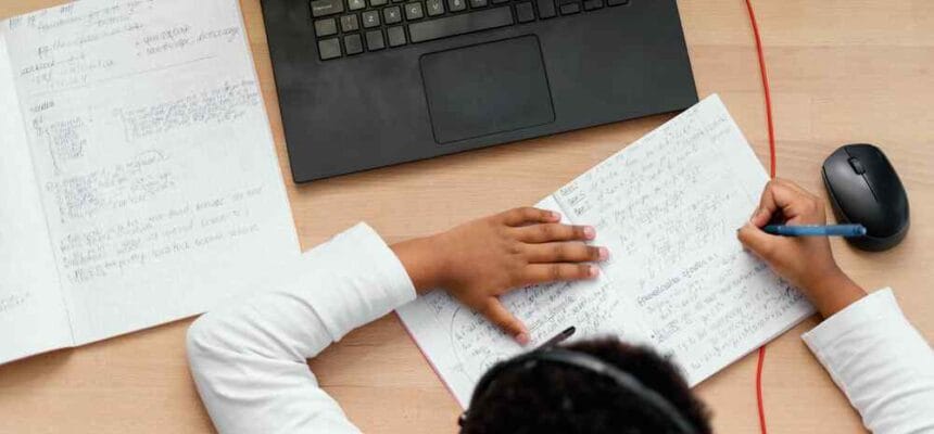 1000-x66-boy-doing-homework-with-use-lapt
