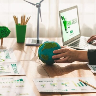 businessman-ceo-green-corporate-company-holding-paper-earth-as-concept-environmental-friendly-business-reduce-co2-emission-carbon-footprint-cleann-ecology-trailblazing-1