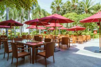 jpeg-optimizer_empty-outdoor-patio-table-chair-with-umbrella