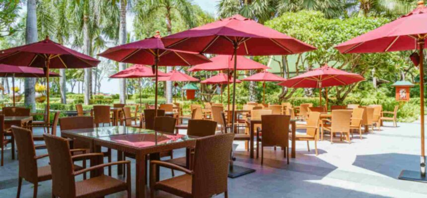 jpeg-optimizer_empty-outdoor-patio-table-chair-with-umbrella