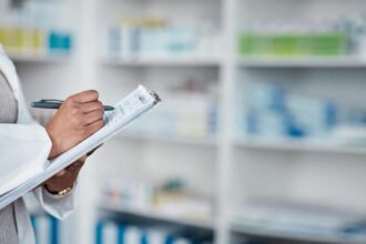 jpeg-optimizer_woman-hands-pharmacy-clipboard-writing-medical-stock-check-medicine-product-research-pills-pres